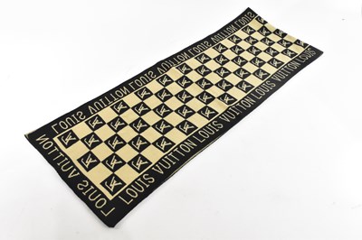 Lot 1905 - LOUIS VUITTON; a wool and acrylic mix beige...