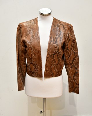 Lot 1951 - YVES SAINT LAURENT; a short python snakeskin...