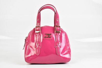 Lot 2064 - ZANDRA RHODES; a fuchsia pink leather handbag,...