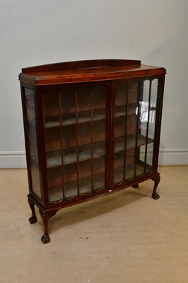 Lot 2406 - An early 20th century walnut display cabinet...