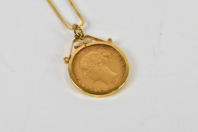 Lot 1594 - A Victorian full sovereign, 1877, in 9ct gold...