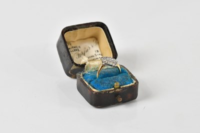 Lot 1303 - A yellow metal diamond ring, with lozenge...