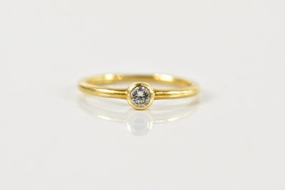 Lot 1324 - CARTIER; an 18ct yellow gold diamond solitaire...