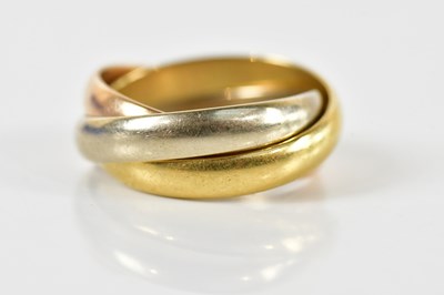 Lot 68 - CARTIER; a three tone gold trinity ring,...