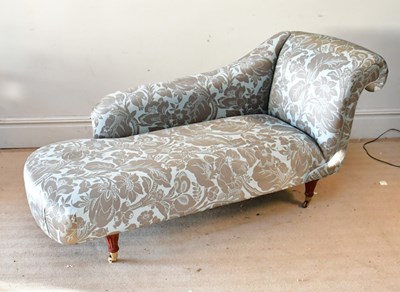 Lot 2224 - A modern chaise lounge, with floral blue...