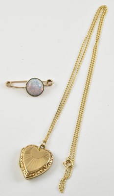 Lot 970 - A 9ct gold dainty necklace, length 54cm,...