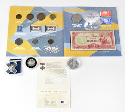 Lot 636 - A 'World War II Remembered' pack, a silver...