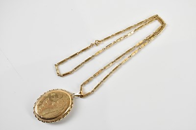 Lot 1605 - A 9ct yellow gold oval locket on box link...