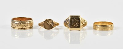 Lot 1331 - Four 9ct yellow gold rings including two...