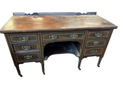 Lot 1228 - An Edwardian inlaid mahogany kneehole dressing...