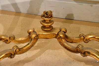 Lot 38 - A gilt wood serpentine fronted marble top...