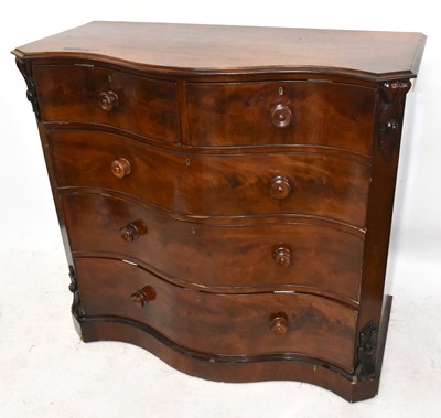 Lot 1546 - A 19th century mahogany serpentine chest of...