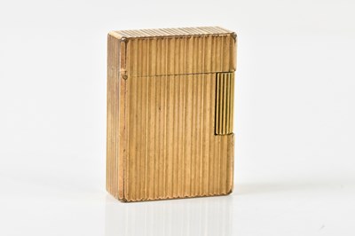 Lot 2599 - DUPONT; a gold plated ribbed lighter of...