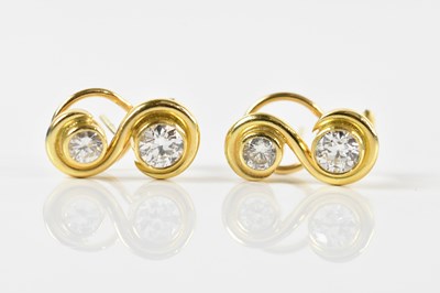 Lot 1666 - A pair of yellow metal diamond set earrings,...