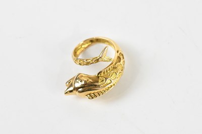 Lot 1410 - A yellow metal stylised dolphin ring of...