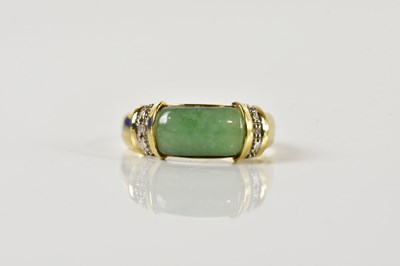 Lot 1501 - A yellow metal jade and diamond set ring,...