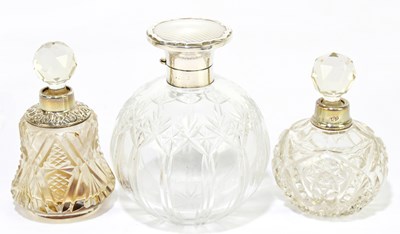 Lot 2428 - Three cut glass perfume bottles with...
