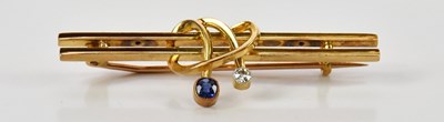 Lot 274 - A 15ct yellow gold bar brooch set with single...