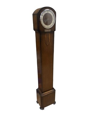 Lot 1284 - A mid 20th century Art Deco style longcase...