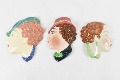 Lot 1422 - COPE & CO; an Art Deco style lady wall mask,...
