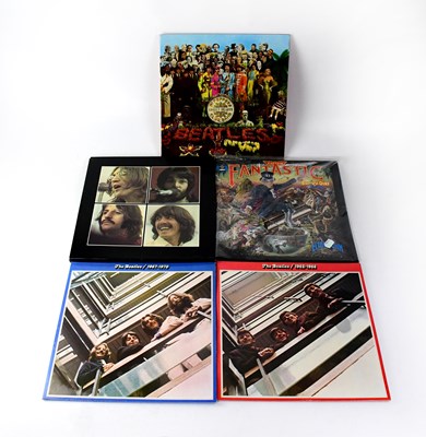 Lot 437 - THE BEATLES; four vinyl albums comprising two...