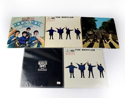 Lot 429 - THE BEATLES; a small quantity of vinyl LPs...