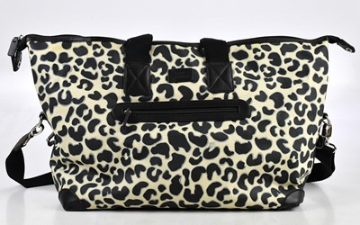 Lot 655 - LULU GUINNESS; a black and cream coated canvas...