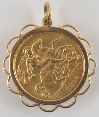 Lot 1199 - A George V 1912 half sovereign, in yellow...