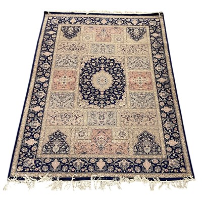 Lot 58 - A modern blue ground Persian style rug, with...