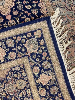 Lot 58 - A modern blue ground Persian style rug, with...