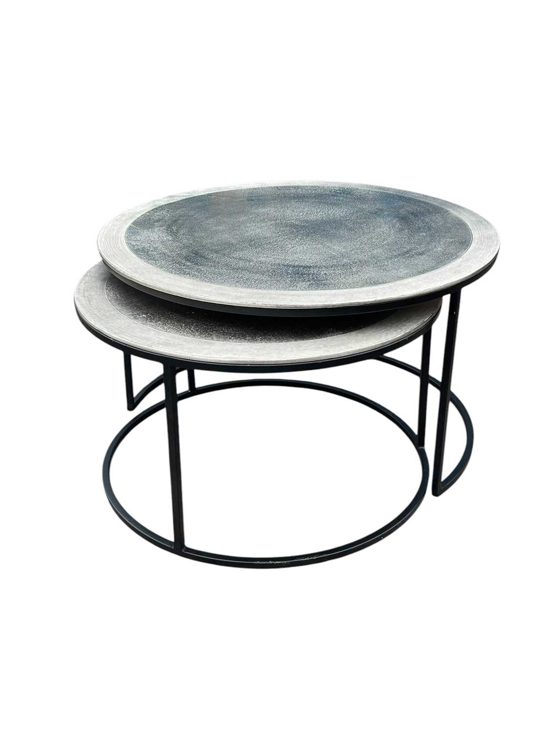 Lot 28 - A contemporary black and silvered metal nest...