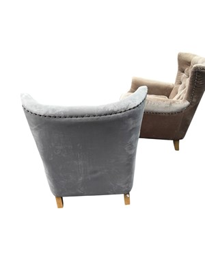 Lot 40 - A pair of modern grey upholstered wingback...