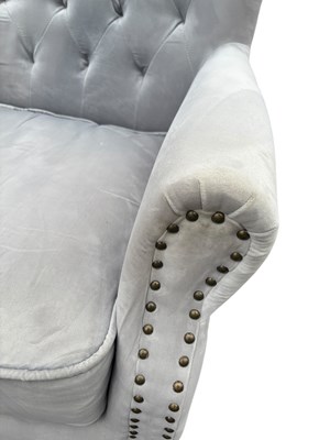 Lot 40 - A pair of modern grey upholstered wingback...
