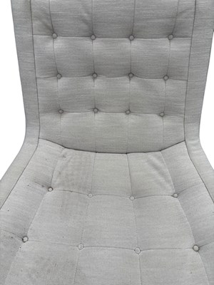 Lot 29 - A contemporary swivel lounge chair upholstered...