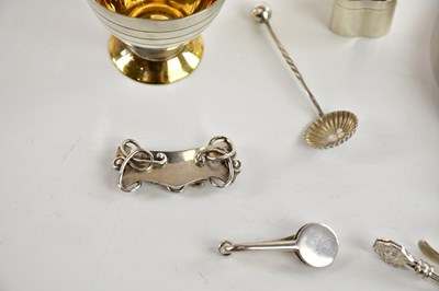 Lot 87 - A contemporary white and yellow metal cup and...