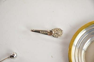 Lot 87 - A contemporary white and yellow metal cup and...