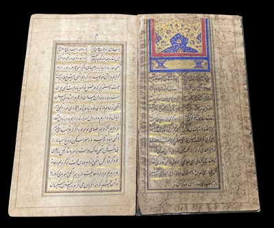 Lot 714 - An Ancient Persian Qajar leather bound...