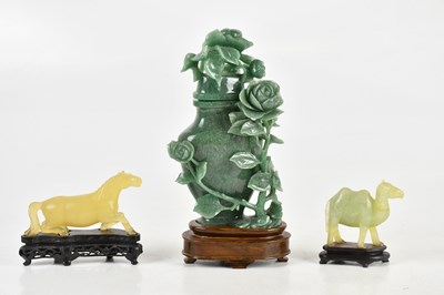 Lot 2865 - A Chinese hardstone vase and cover on stand,...