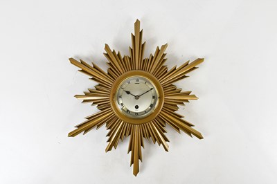 Lot 2490 - ELIOTT; an Art Deco style sunburst wall clock,...