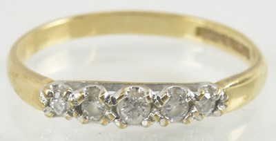 Lot 1170 - A 9ct five gold stone diamond set ring, size P,...