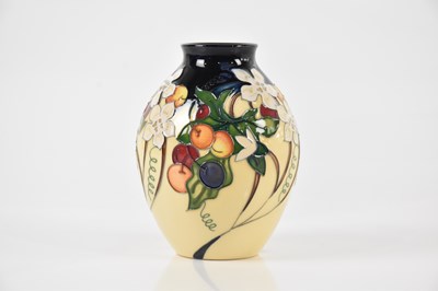 Lot 1440 - NICOLA SLANEY FOR MOORCROFT; a small vase of...