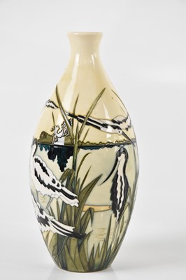 Lot 1407 - MOORCROFT; an ovoid pattern vase in the...