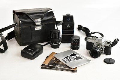 Lot 1692 - NIKON; a Nikon EL2 35mm film camera, serial No....
