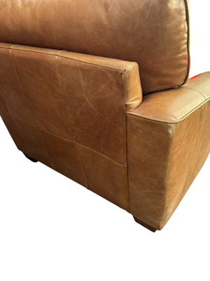 Lot 41 - A tan leather arm chair, height 80cm, depth...