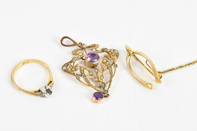 Lot 395 - An Edwardian seed pearl and amethyst pendant,...