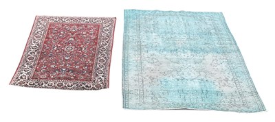 Lot 60 - A modern machine made Persian style red ground...