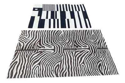 Lot 61 - RALO CARPET; a modern machine made grey and...