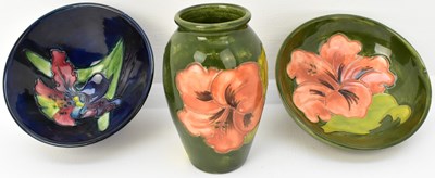 Lot 538 - MOORCROFT; three small cabinet items...