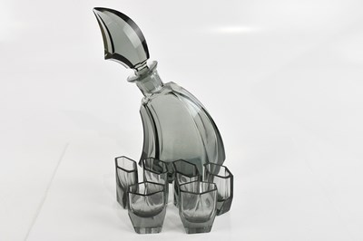 Lot 1449 - An Art Deco smoky glass seven piece drinking...