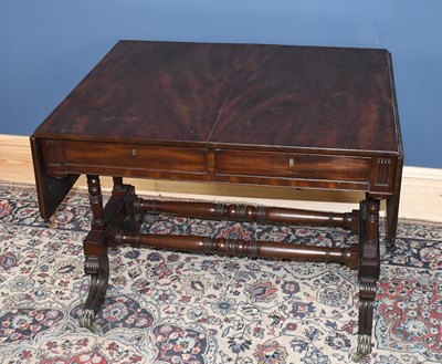 Lot 1566 - A Regency mahogany sofa table with two real...